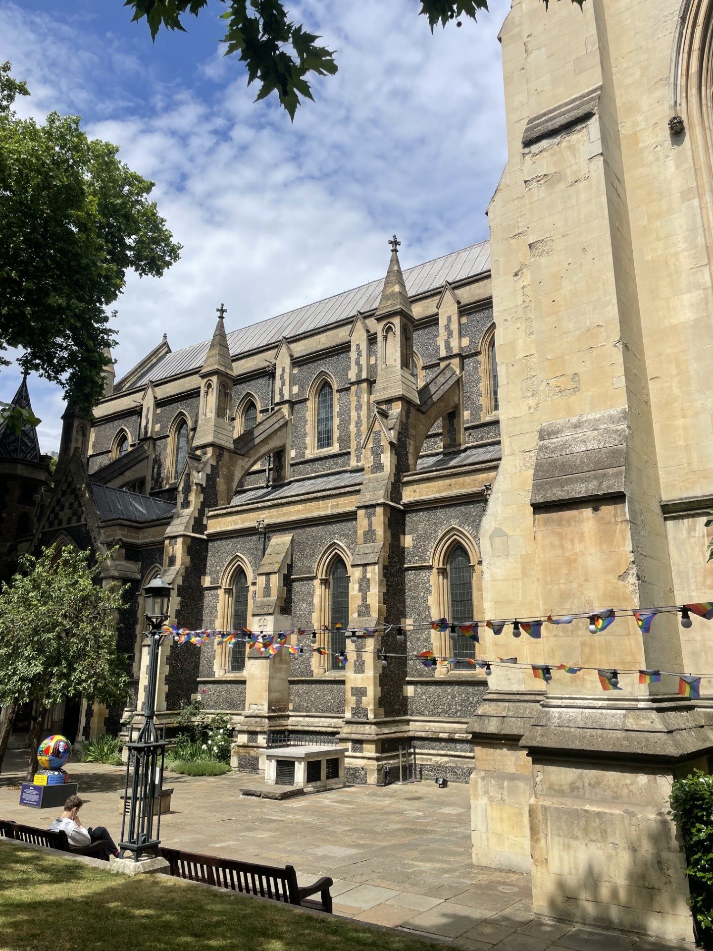 Pride flags hanging up outside Southwark Cathedral